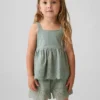 Top con dobladillo de ojales para bebés y niños pequeños