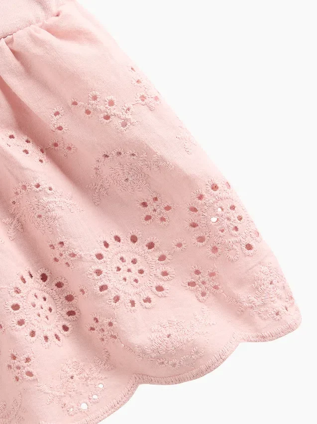 Top con dobladillo de ojales para bebés y niños pequeños