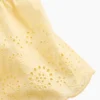 Top con dobladillo de ojales para bebés y niños pequeños