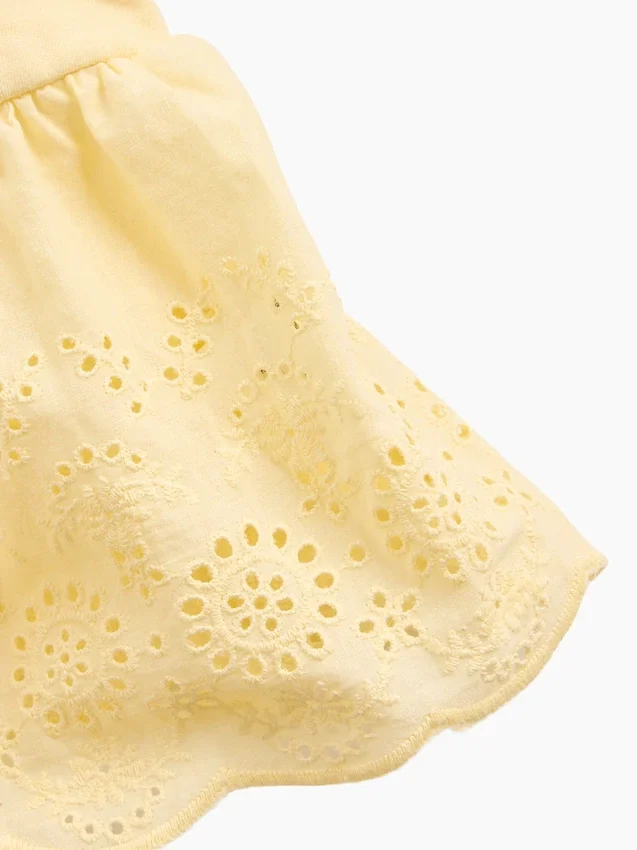Top con dobladillo de ojales para bebés y niños pequeños