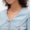 Top con peplum, cuello en V y cuello