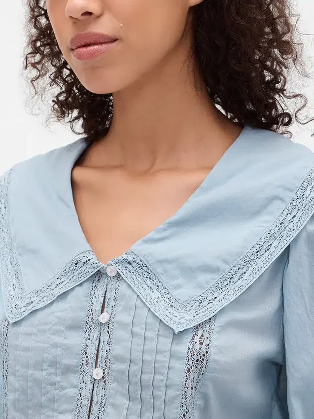 Top con peplum, cuello en V y cuello