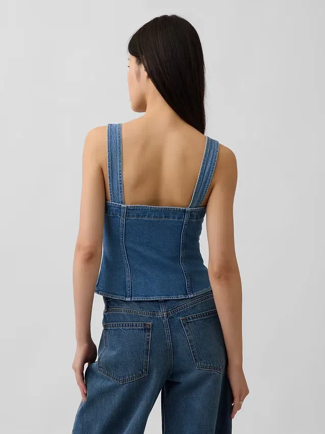 Top corsé con bolsillos de denim