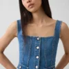 Top corsé con bolsillos de denim