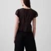 Top corto con peplum de gasa de encaje