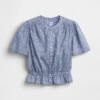 Top corto con peplum y cierre frontal de botones
