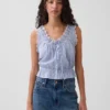 Top corto con peplum y lazo delantero con ojales