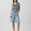 Top corto con peplum y lazo delantero con ojales