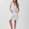 Top corto con peplum y lazo delantero con ojales