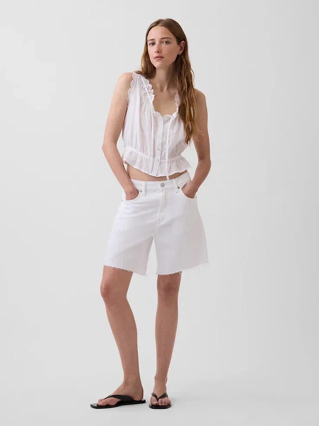 Top corto con peplum y lazo delantero con ojales