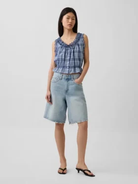 Top corto con peplum y lazo delantero con ojales