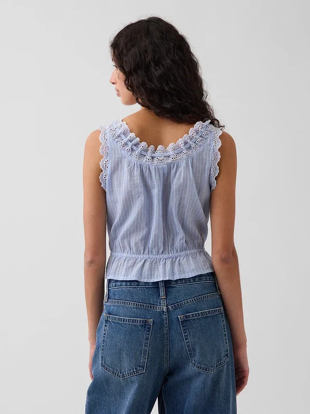 Top corto con peplum y lazo delantero con ojales