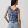 Top corto con peplum y lazo delantero con ojales