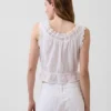Top corto con peplum y lazo delantero con ojales