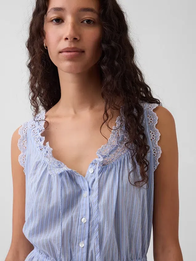 Top corto con peplum y lazo delantero con ojales