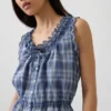 Top corto con peplum y lazo delantero con ojales