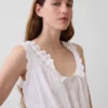 Top corto con peplum y lazo delantero con ojales