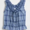 Top corto con peplum y lazo delantero con ojales