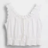 Top corto con peplum y lazo delantero con ojales