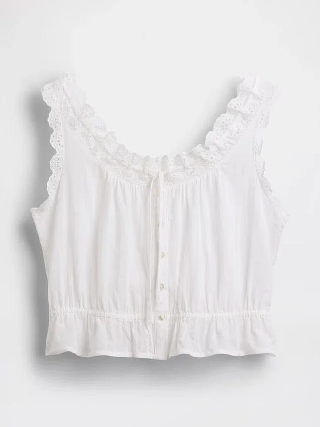 Top corto con peplum y lazo delantero con ojales