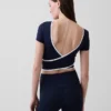 Top corto cruzado reversible GapFit Smooth