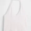 Top corto de cuello halter de punto tupido