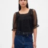 Top de tul transparente bordado