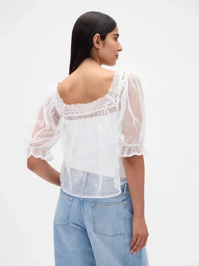 Top de tul transparente bordado