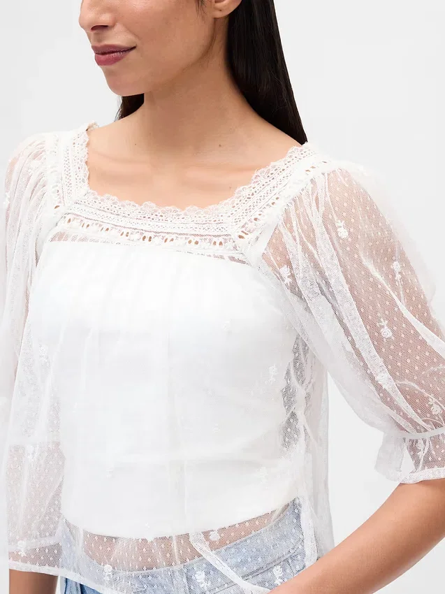 Top de tul transparente bordado