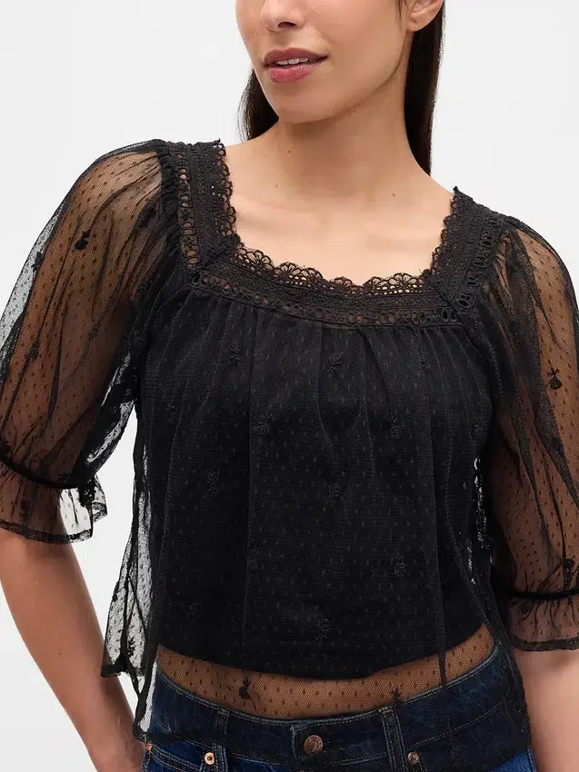 Top de tul transparente bordado