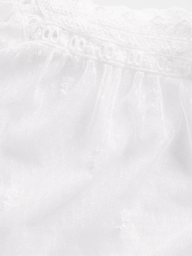 Top de tul transparente bordado