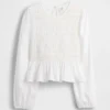 Top infantil con peplum y fruncido