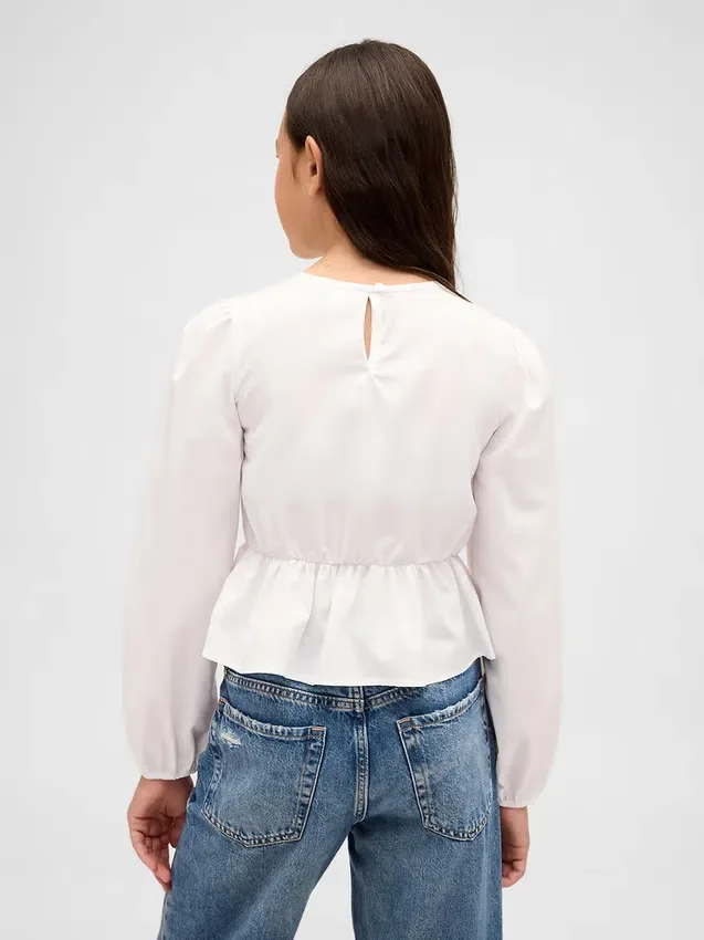 Top infantil con peplum y fruncido