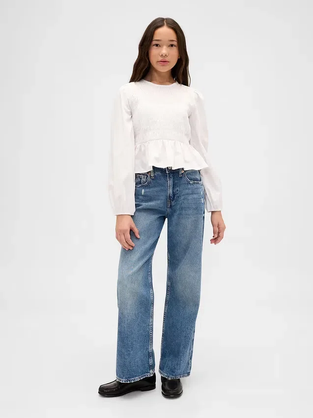Top infantil con peplum y fruncido