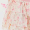 Tutu de pétalos con estampado floral discreto de Sweet Wink