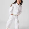 Vaqueros con bajo de ojales y diseño de herradura para Bebé y Niño