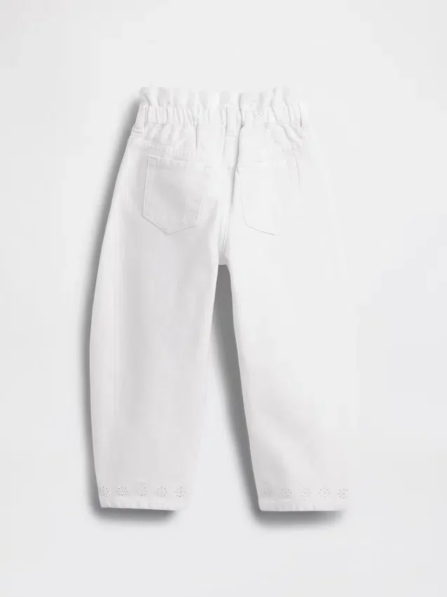Vaqueros con bajo de ojales y diseño de herradura para Bebé y Niño