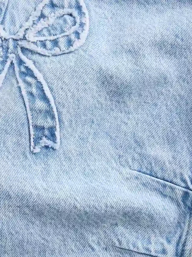 Vaqueros con lazo y corte en herradura para bebés y niños pequeños