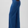 Vaqueros de talle alto con pinzas y pierna ancha GAP × Hfr de Atelier Ndigo