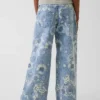 Vaqueros holgados de cintura baja con estampado floral para niños