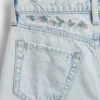 Vaqueros infantiles de talle bajo, corte ancho y pierna ancha
