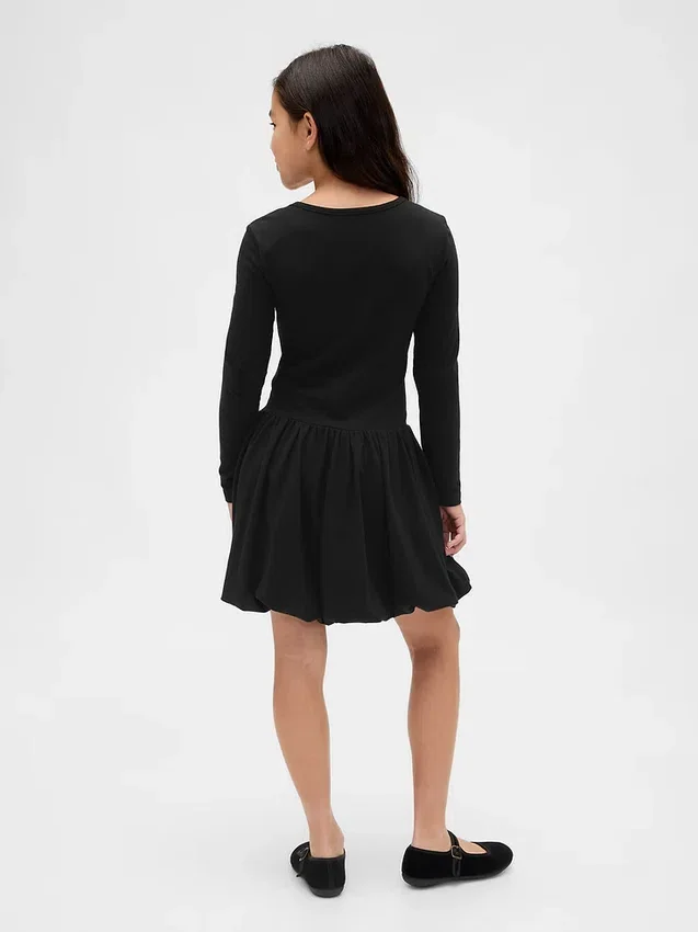 Vestido de niñita con corte abullonado