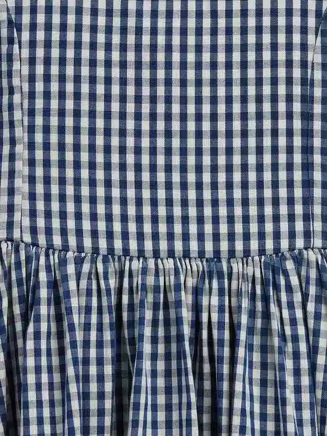 Vestido de vaqueros a cuadros para niña
