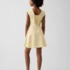 Vestido infantil de lino y algodón con cuello redondeado
