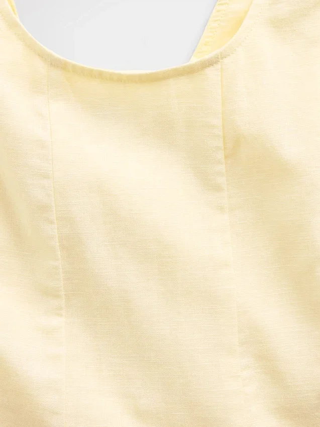 Vestido infantil de lino y algodón con cuello redondeado