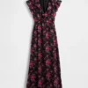 Vestido largo con cuello en V y volantes