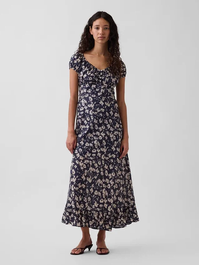 Vestido largo con cuello en V y volantes en el bajo