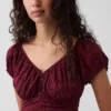 Vestido largo con cuello en V y volantes en el bajo