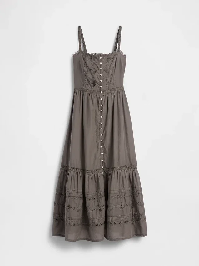 Vestido largo con volantes y ojales