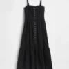 Vestido largo con volantes y ojales